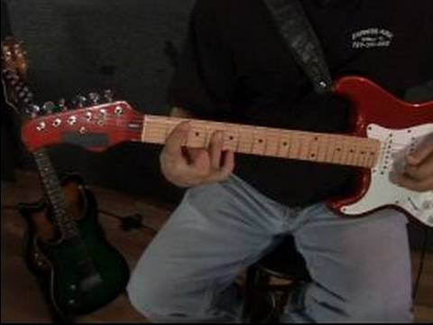 How to Play Left Handed Guitar : How to Play a B Chord on a Left Handed Guitar