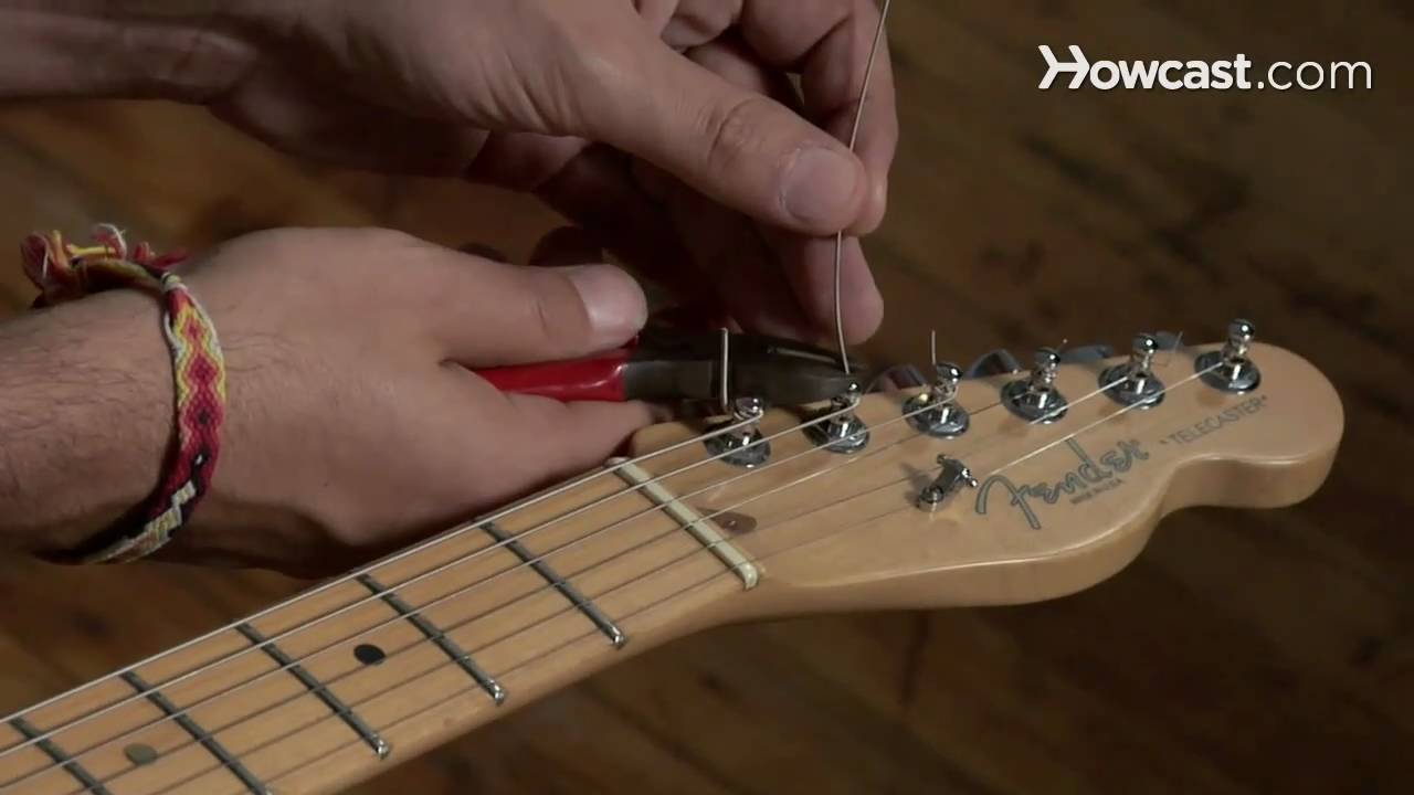 How to Play Guitar: Beginners / Restringing an Electric Guitar